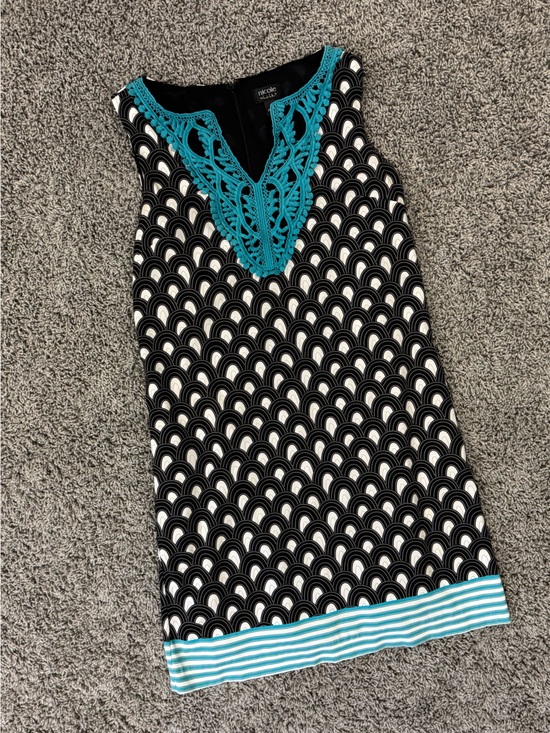 Nicole Miller Dresses & Skirts - Nicole Miller Black Dress with Teal Crochet Trim